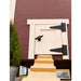 Close-up of the Classic OverEZ Large Chicken Coop chicken door and ramp.