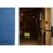Interior of the blue Coastal OverEZ Large Chicken Coop with chickens and roosts.