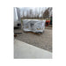 Large Chicken Coop components wrapped on a delivery pallet in a customer driveway