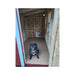 Customer's dog standing inside a Large Chicken Coop during setup