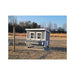 Large Chicken Coop repainted gray by the customer in an open field