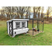 White and dark-trim Farmhouse OverEZ Large Chicken Coop beside a covered chicken run.