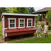 Family standing beside an OverEZ XL Classic Chicken Coop in a backyard.