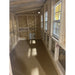 Interior left wall of the OverEZ XL Chicken Coop with windows and roost space.