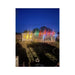 OverEZ XL chicken coop and customer-added enclosed run at night with multicolored lights.