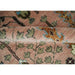Pink, Olive and Beige hand-knotted wool rug, rolled edge and pile detail