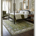 Royal Green and Ivory rug placed beneath a bed in a bedroom