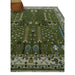 Angled view of the Royal Green and Ivory rug with its cream border