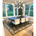 Royal Green and Ivory rug beneath a dining table and chairs