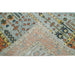 Angled close-up of the rug surface with an overlapping folded edge