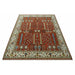 Angled view of the full rust and ivory rug against a white background.