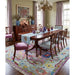 The Rug Decor TRDCP1036 staged in a dining room. The table and chairs are not included.