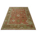 Low frontal full view of the hand-knotted Oushak rug
