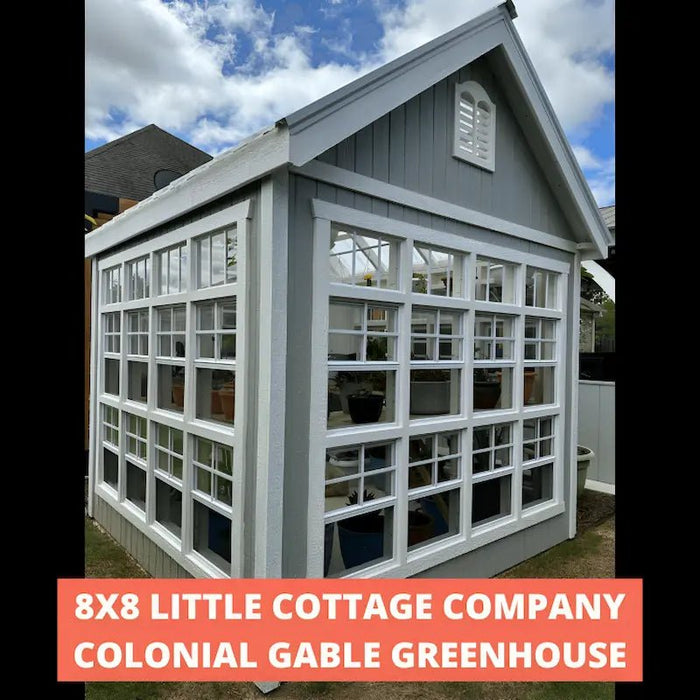 little cottage company 8x8 colonial gable greenhouse painted gray with plants inside