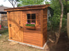 cedarshed lean to storage bayside shed with flower pot